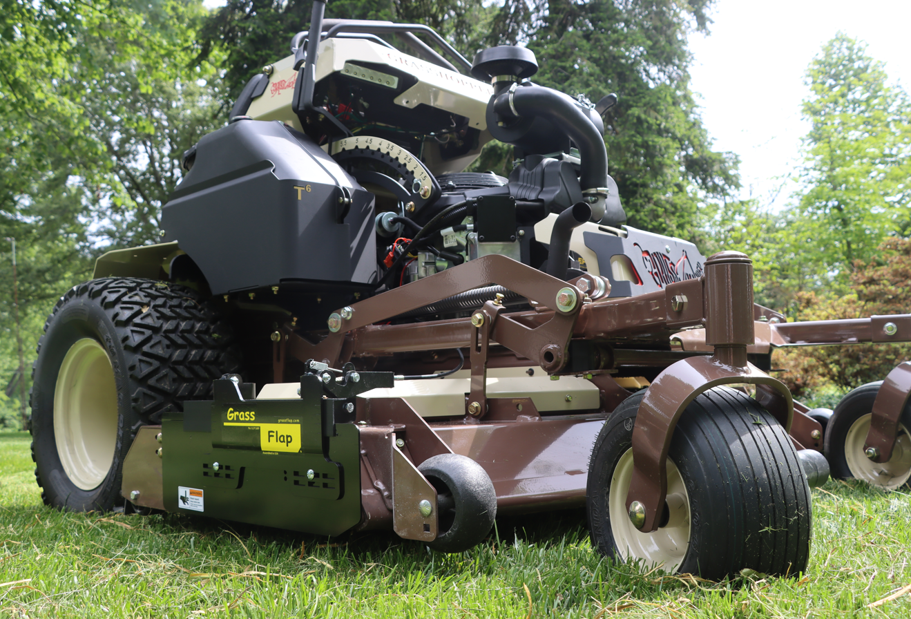 Grassflap chute blocker on a mower